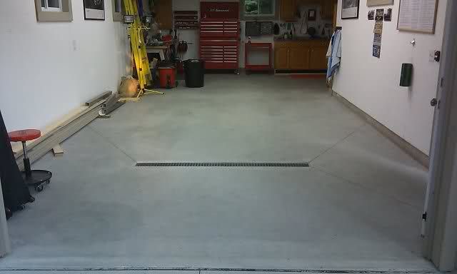 concrete garage floor with drain - installation in sartell minnesota